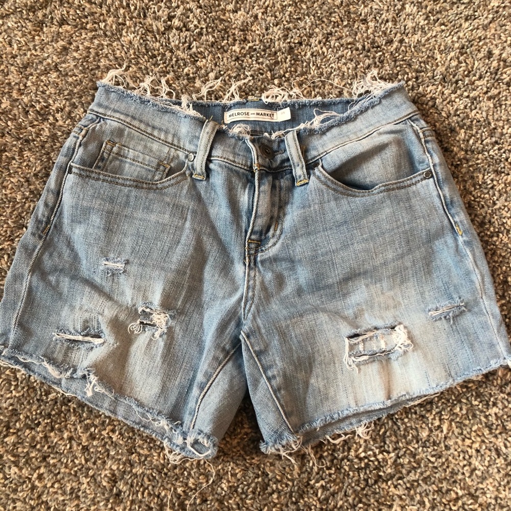 distressed light wash jean shorts
